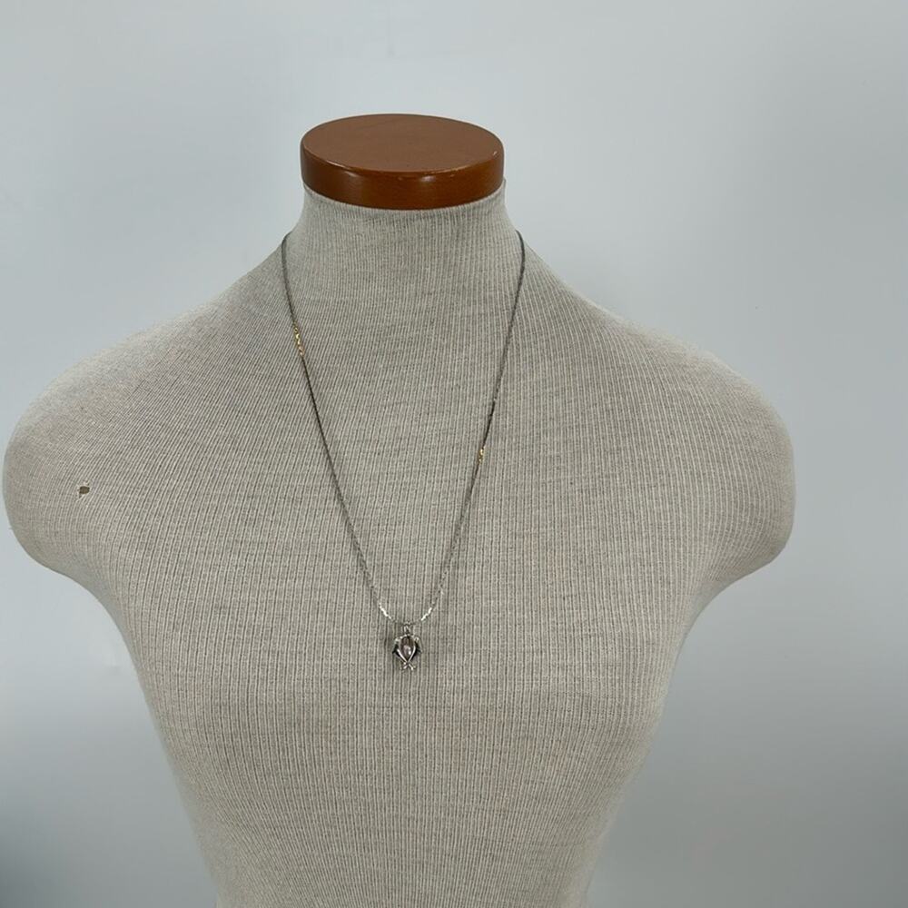 Silver dolphin pearl necklace